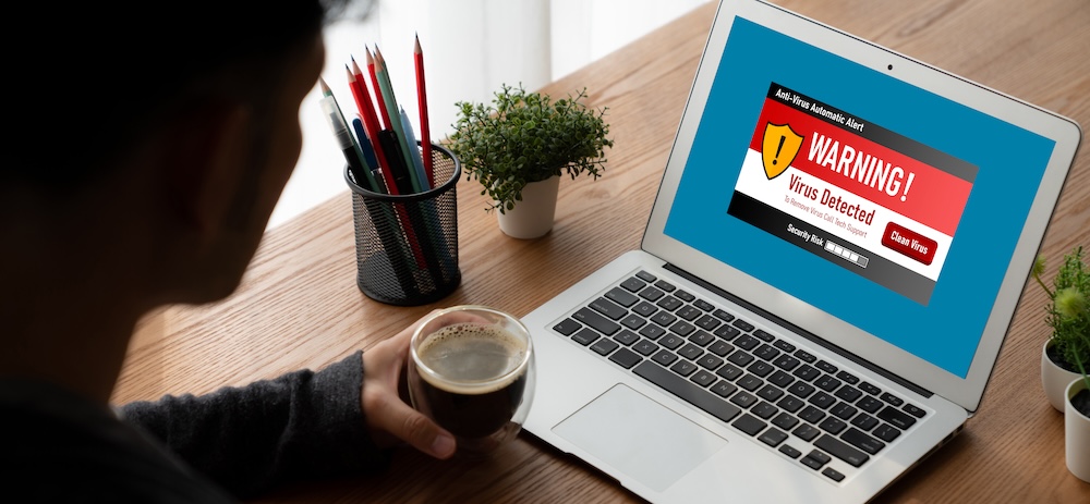 Virus warning alert on computer screen detected modish cyber threat , hacker, computer virus and malware